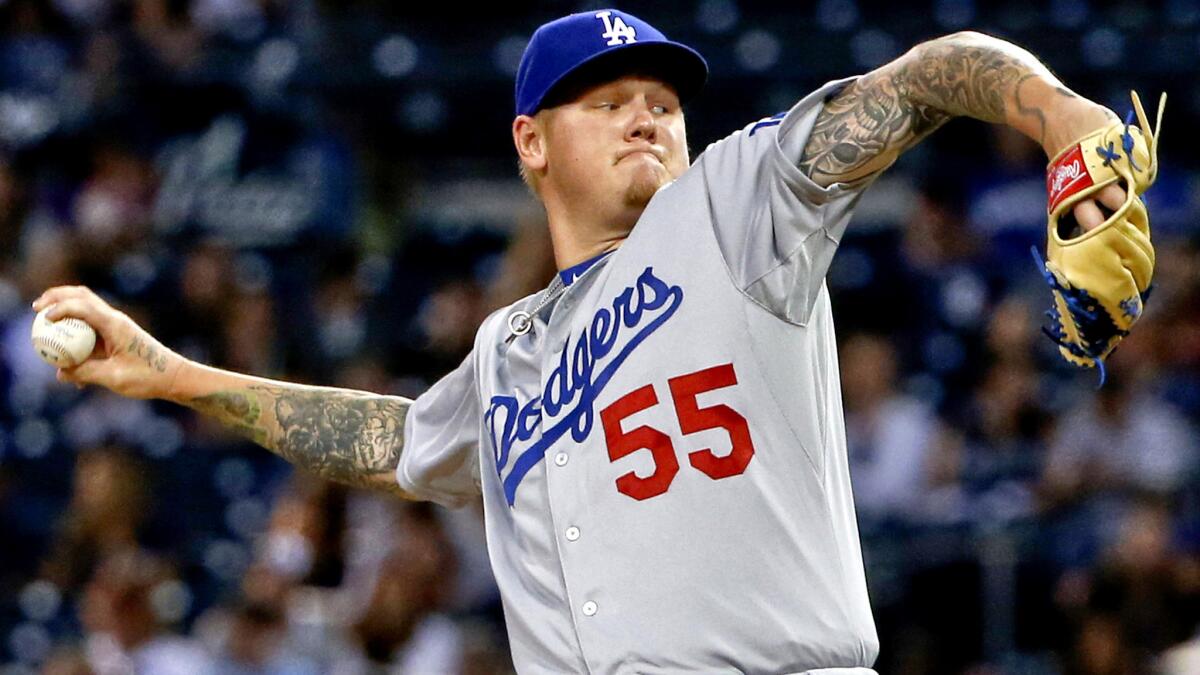 Dodgers starter Mat Latos gave up eight hits and four runs in four innings Thursday night against the Padres in San Diego.