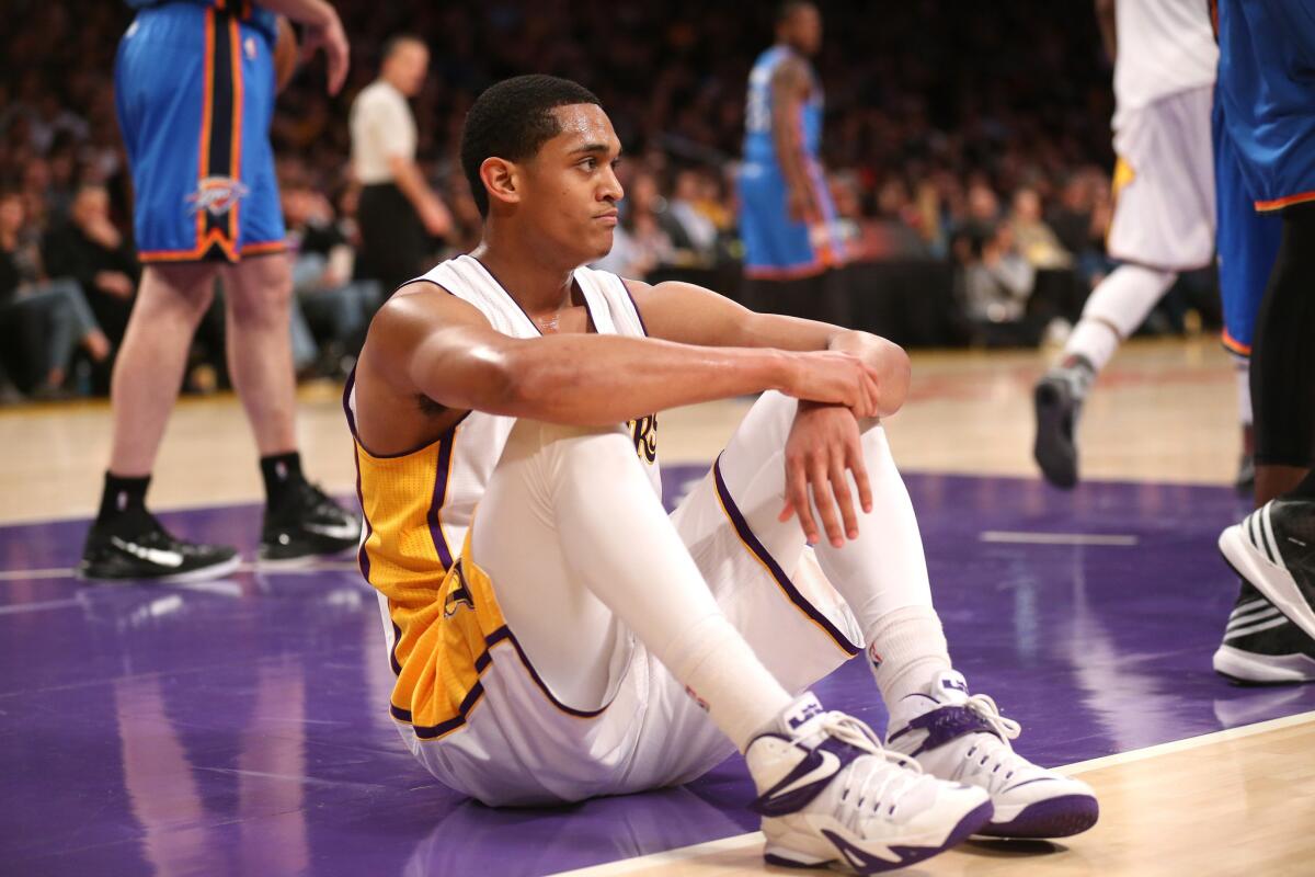 Lakers point guard Jordan Clarkson sits on the floor after being called for an offensive foul in the 108-101 loss to the Thunder.