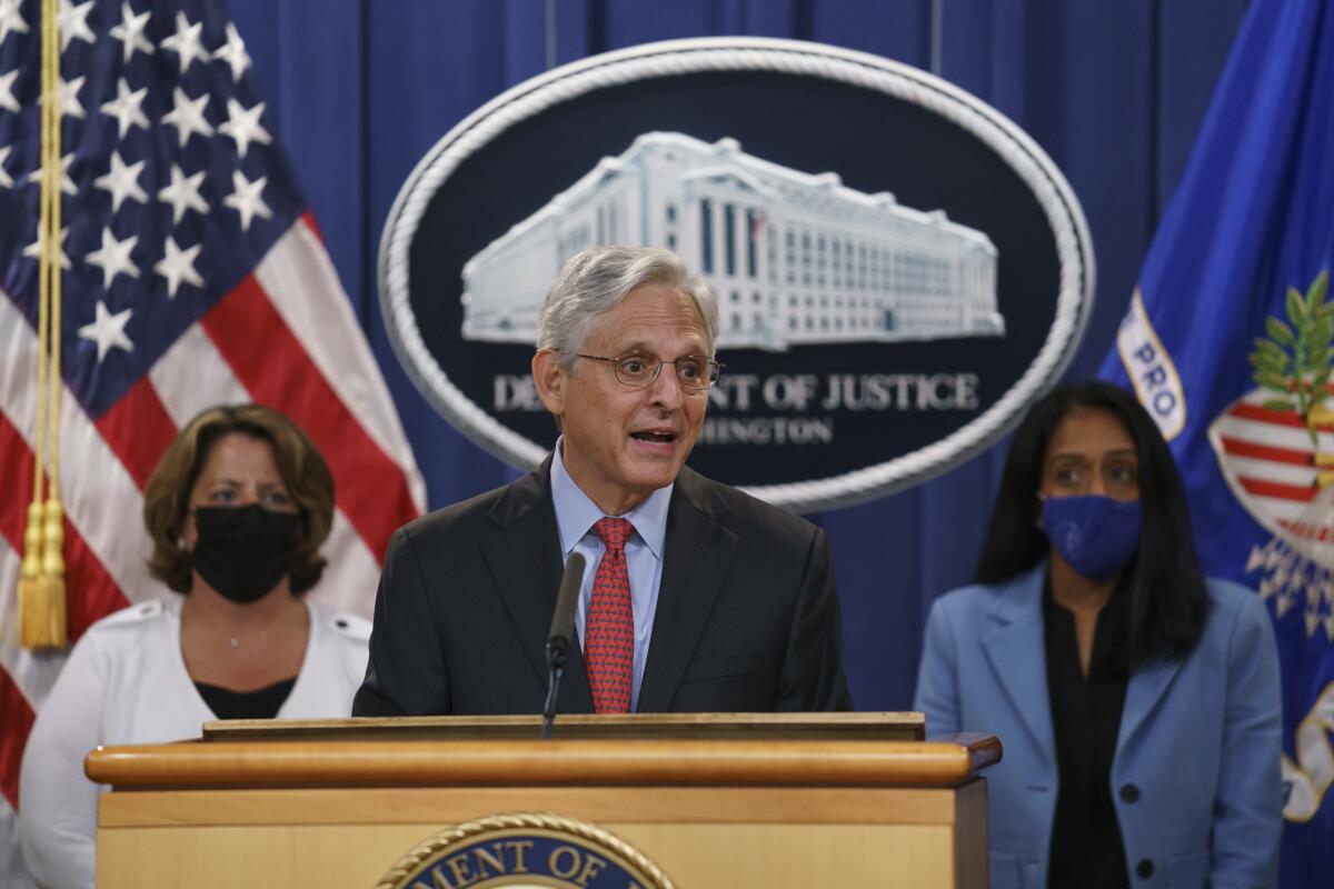 Atty. Gen. Merrick Garland speaks at the Justice Department.