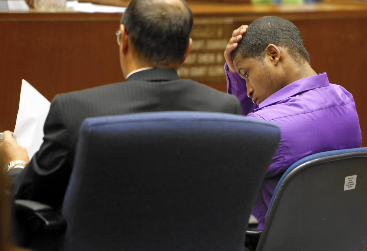 Javier Bolden, right, sits with his defense attorney, Andrew Goldman, during his trial in Los Angeles County Superior Court.