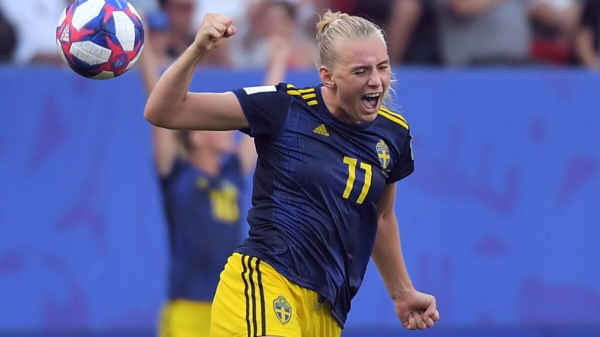 Sweden forward Stina Blackstenius celebrates during a Women's World Cup quarterfinal match against Germany.