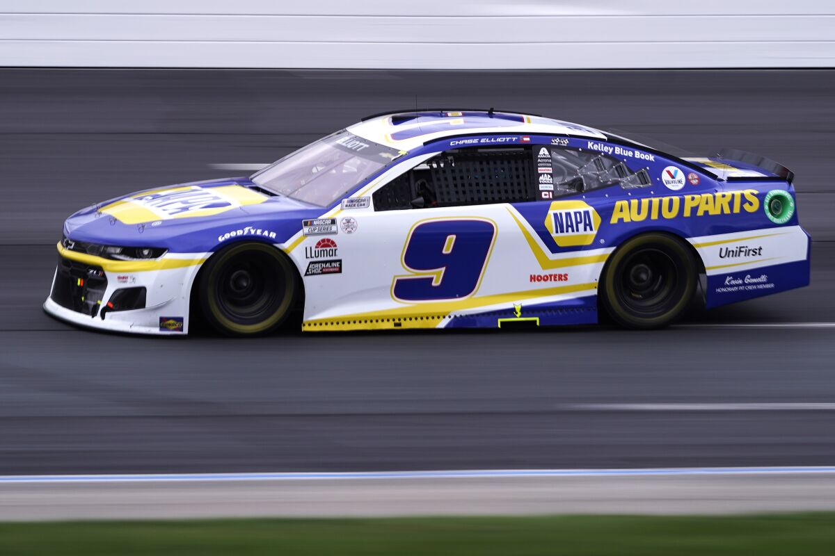 Chase Elliott competes at a NASCAR Cup Series auto race, Sunday, July 18, 2021, in Loudon, N.H. (AP Photo/Charles Krupa)