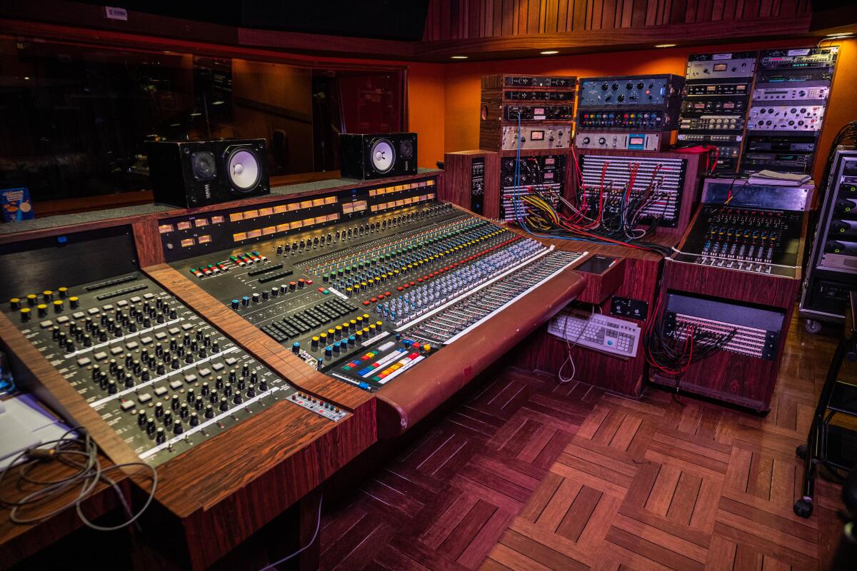Mixing console and other tools in a recording studio at Sunset Sound.