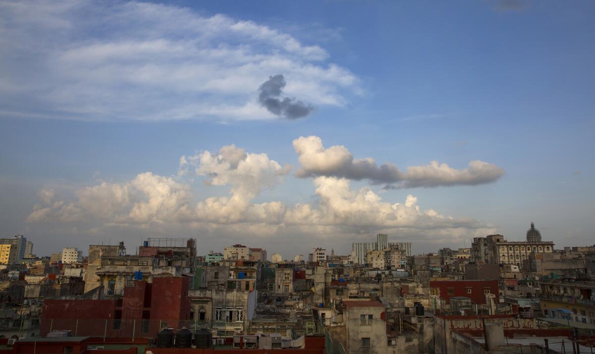 HAVANA, CUBA -- FRIDAY, APRIL 24, 2015: The dome of El Capitolio, the National Capitol Building, right, punctuates the skyline in Havana, Cuba, on April 24, 2015. Prior to the Cuban Revolution of 1959, the Cuban Congress was housed in the building. The Cuban government is restoring the building for use once again as the home of Cuba's National Assembly. (Brian van der Brug / Los Angeles Times)