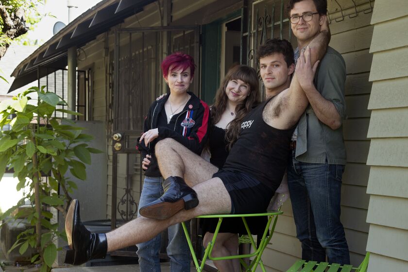 SILVER LAKE, CA-MARCH 27, 2020: left to right-Friends Laurie Penny, Pam Shaffer, Natti Vogel and Sam Braslow are photographed at Penny's home in Silver Lake. As officials order Californians to stay at home to decrease the spread of the coronavirus, some people are making pacts with small circles of friends to see each other and no one else. This group of four call themselves the quarantine gangs, the Fourcans, or Los Quarantinos. (Mel Melcon/Los Angeles Times