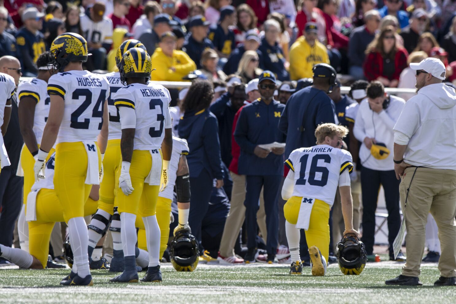 Michigan assistant coach Hart carted off field on backboard - The San Diego  Union-Tribune