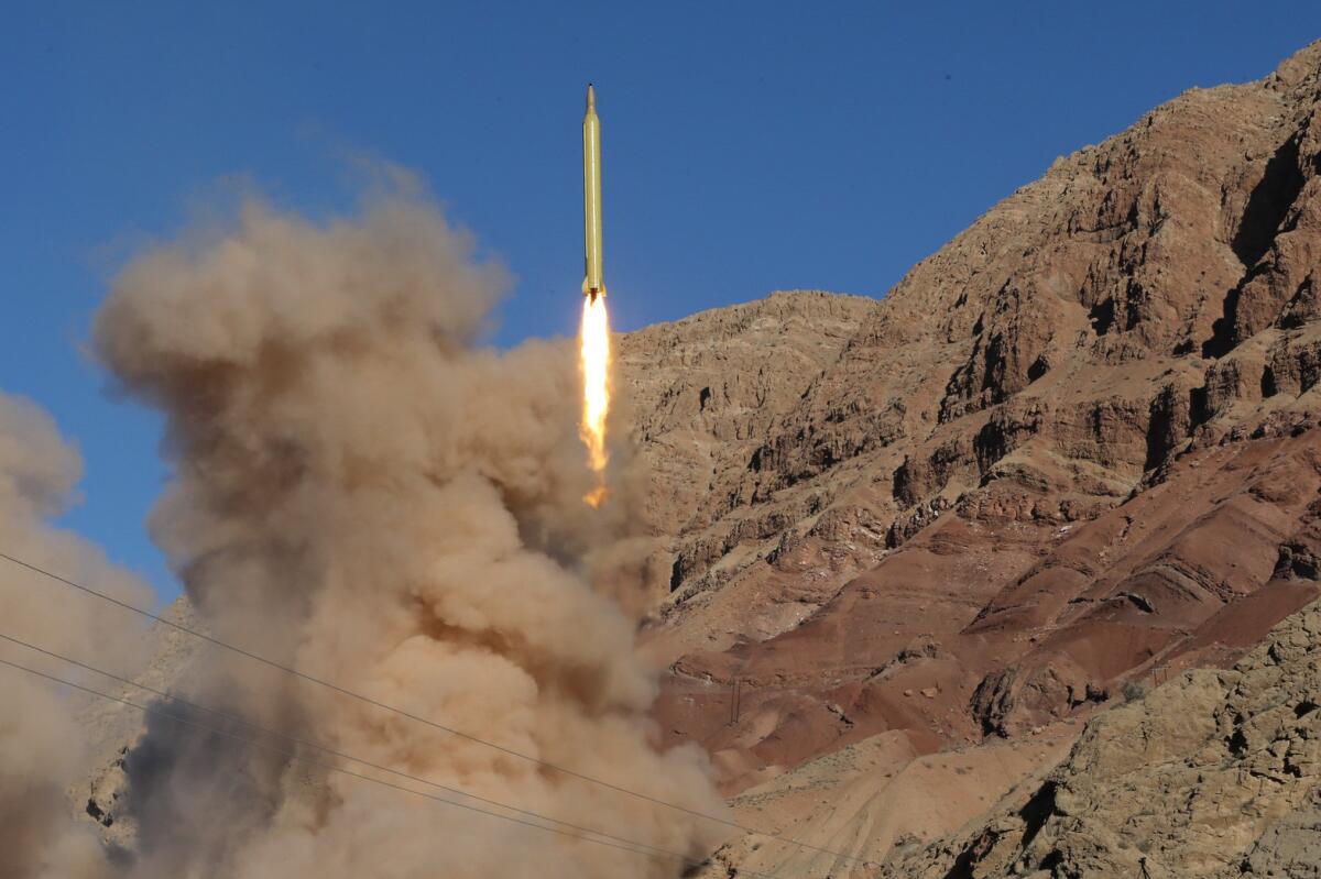 A long-range ballistic missile is launched in the Alborz mountain range in northern Iran on March 9, 2016.