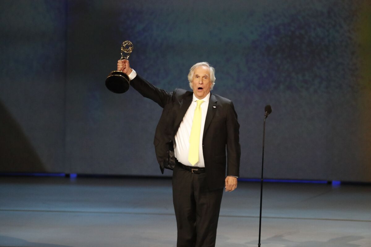 Henry Winkler onstage after winning for supporting actor in a comedy series award for "Barry."