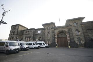 A general view of HMP Wandsworth in London where a British soldier awaiting trial on terror-related charges has escaped from a prison in southwest London Wednesday, Sept. 6, 2023 and police have launched an urgent manhunt. Counterterror police say Daniel Abed Khalife went missing from Wandsworth Prison early Wednesday. (Yui Mok/PA via AP)