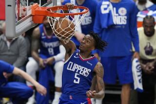 Los Angeles Clippers guard Bones Hyland (5) dunks during the second half of Game 3.