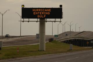 A sign notifies motorists to prepare for Hurricane Beryl, Sunday, July 7, 2024, in Portland, Texas. (AP Photo/Eric Gay)