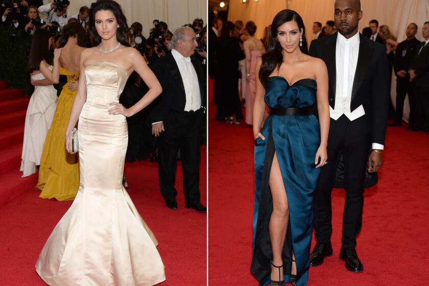 Kendall Jenner attends her first Met Ball with half-sister Kim Kardashian and her fiance, rapper Kanye West.