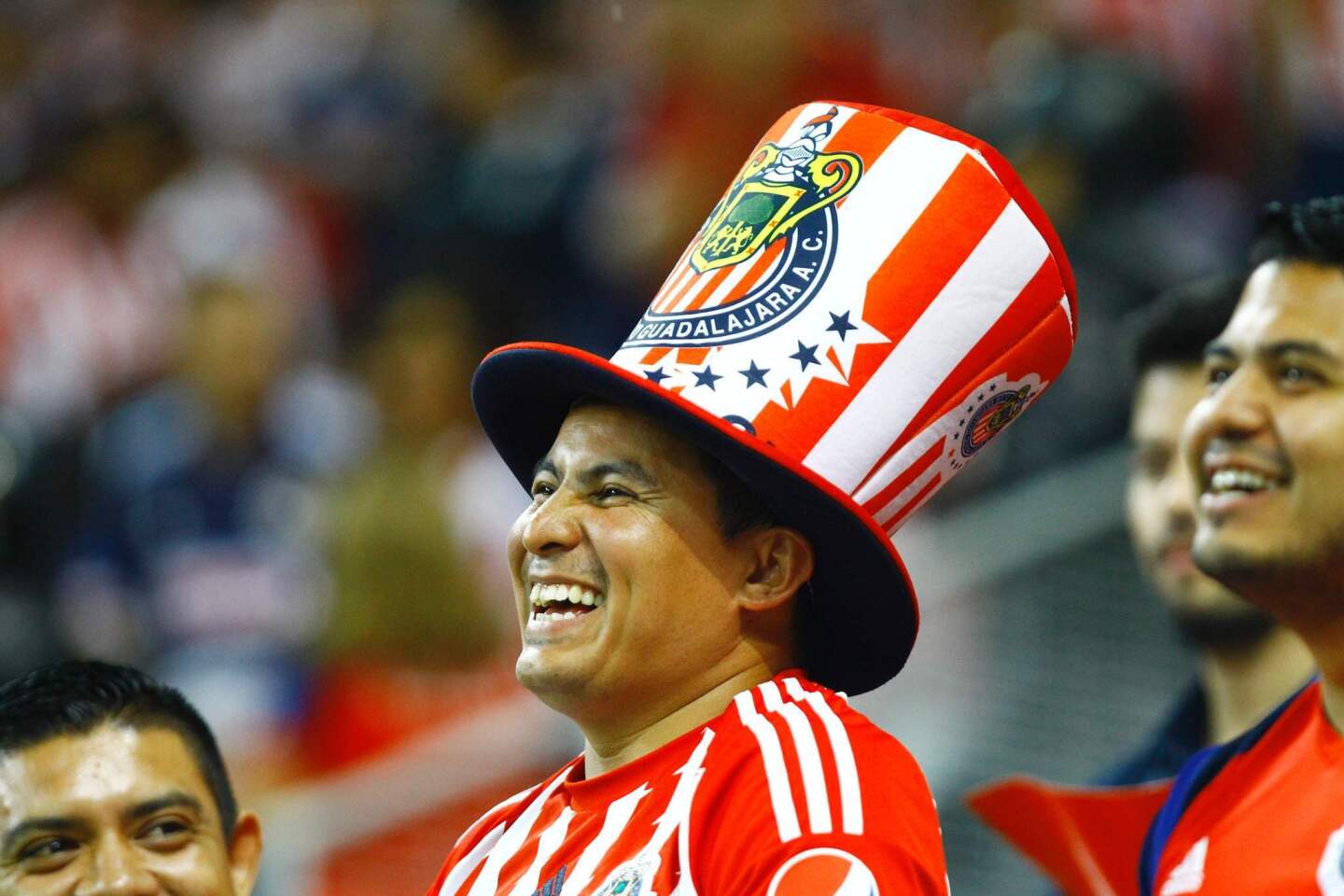 Guadalajara fan cheer during their Mexican Clausura 2016 tournament quarterfinals football match against America at Chivas stadium on 12 May 2016, in Guadalajara, Mexico. / AFP PHOTO / Hector_GuerreroHECTOR_GUERRERO/AFP/Getty Images ** OUTS - ELSENT, FPG, CM - OUTS * NM, PH, VA if sourced by CT, LA or MoD **