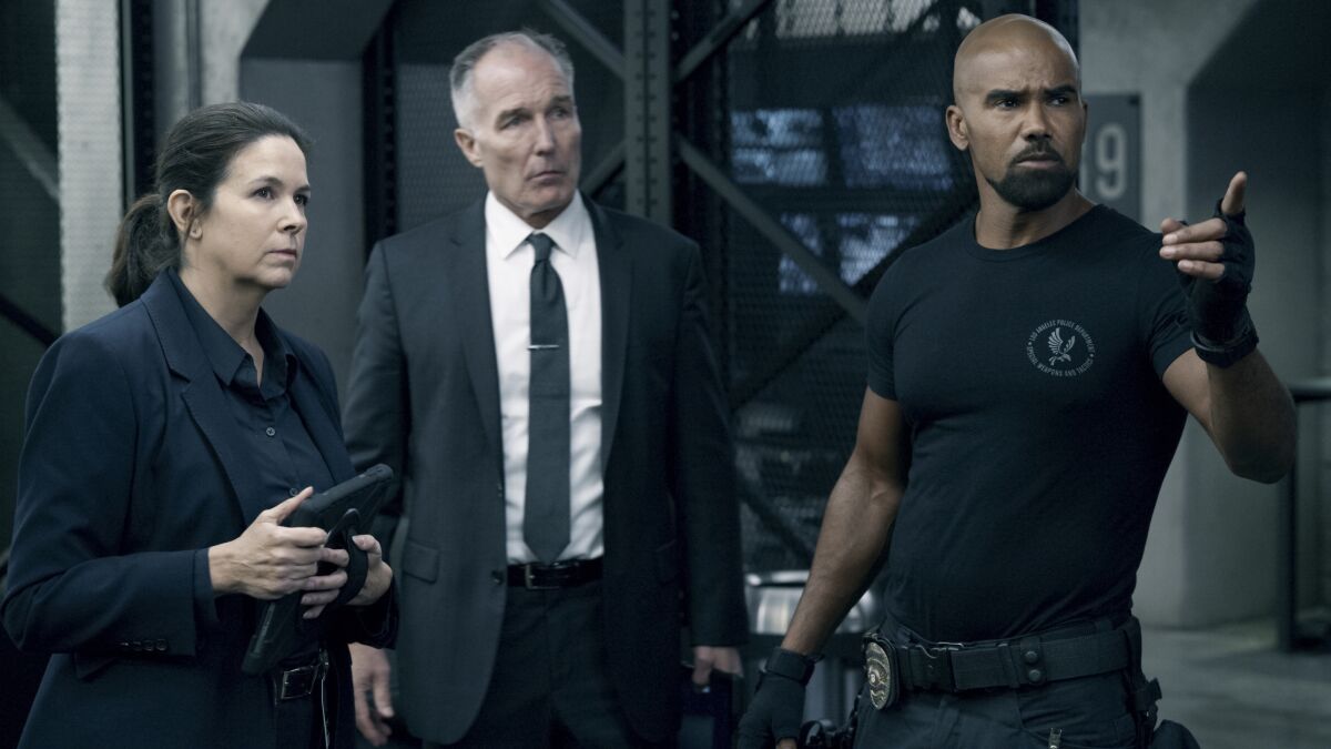  Amy Farrington, Patrick St. Esprit and Shemar Moore in "S.W.A.T." on CBS.
