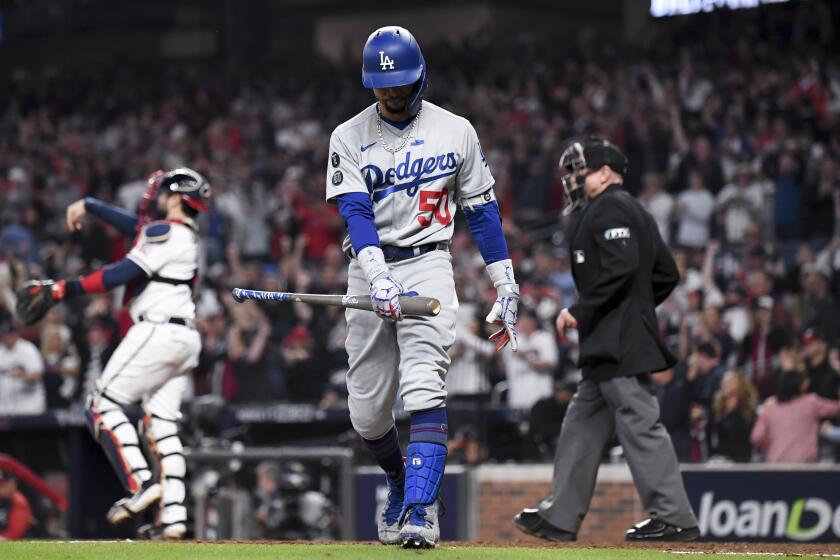 Atlanta, GA - October 23: Los Angeles Dodgers' Mookie Betts reacts after striking out during the seventh inning.