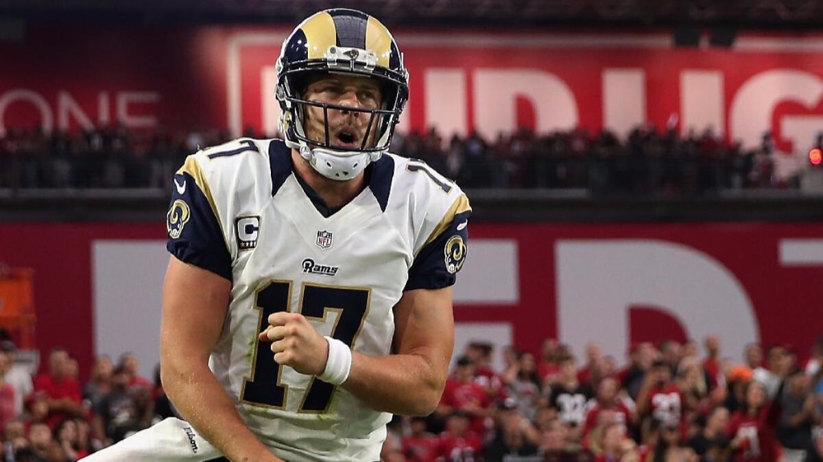 Case Keenum is getting props from Rams offensive coordinator Rob Boras, who says that the quarterback is "getting us in the right plays and he’s making plays with his arm and he made some plays with his feet the other day as well.”