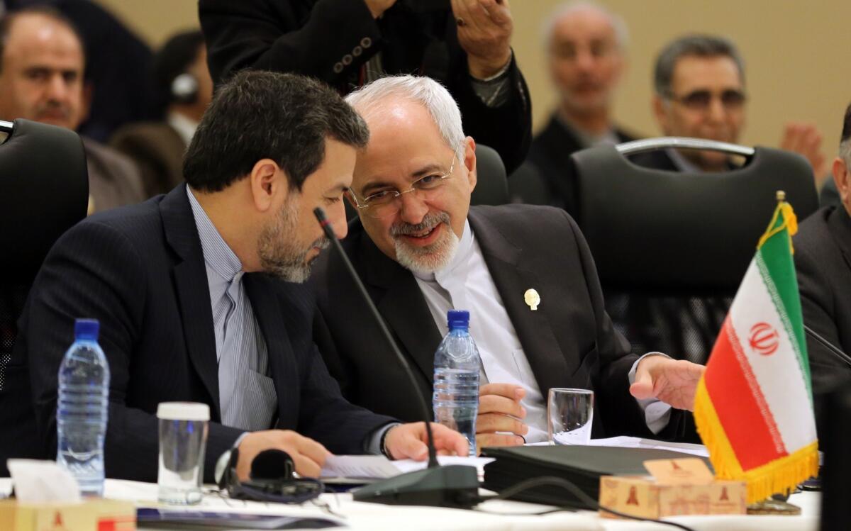 The Obama administration said comments by Iranian Deputy Foreign Minister Abbas Araqchi, left, pictured in November with Foreign Minister Mohammad Javad Zarif in Tehran, had been misconstrued and that there is no hidden plan.