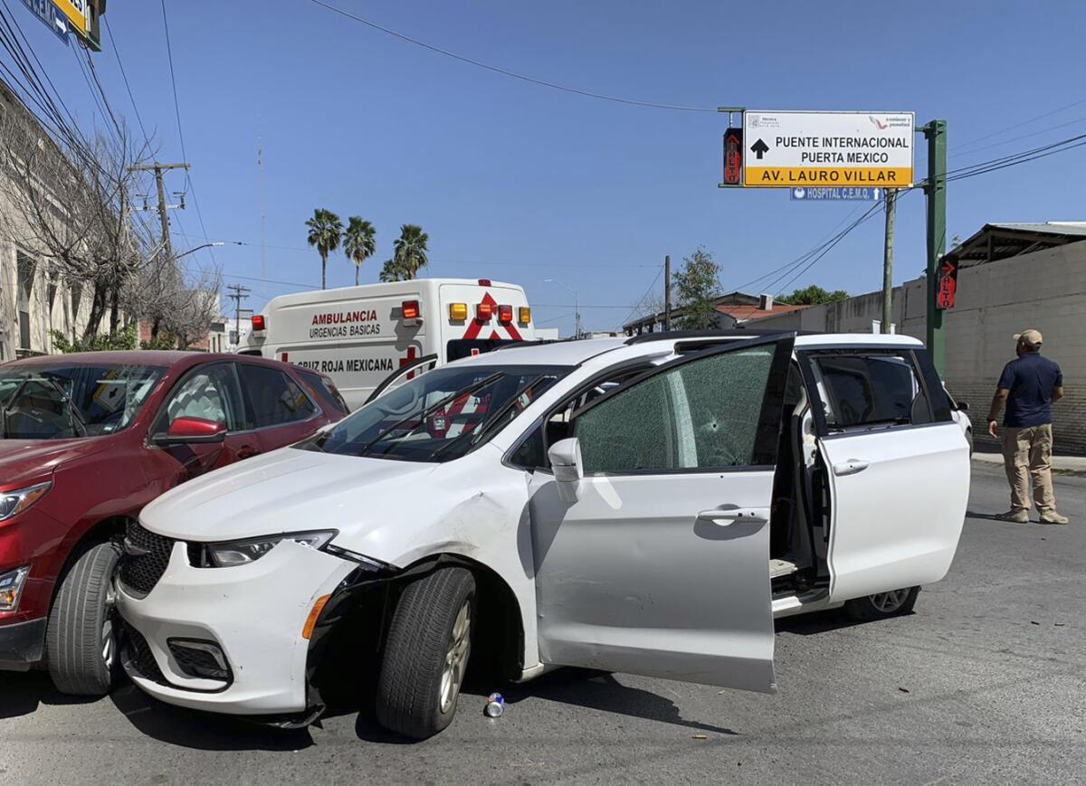 White minivan smashed into side of red car