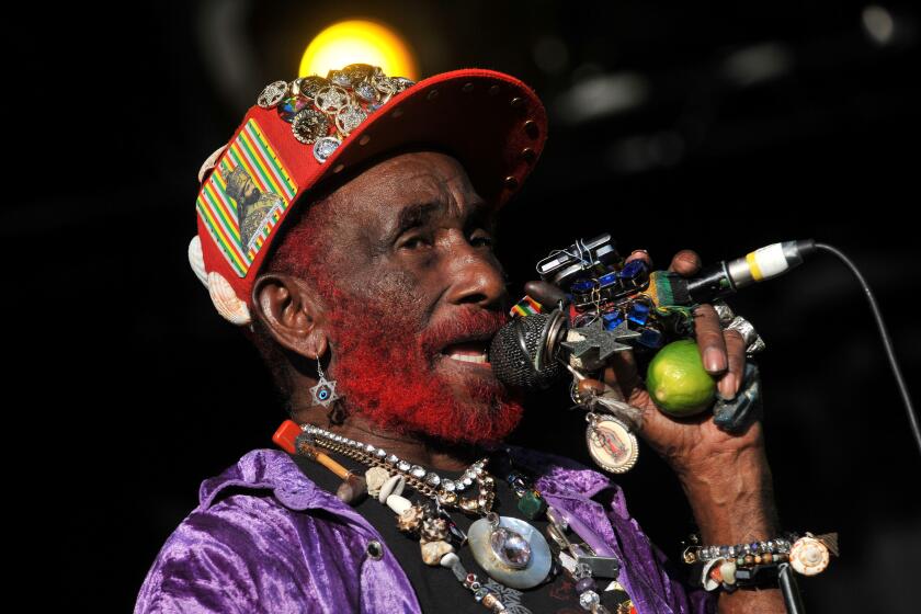 Womad Festival 2013 - Wiltshire. EDITORIAL USE ONLY. Lee 'Scratch' Perry performs during WOMAD Festival 2013, held at Charlton Park, Wiltshire. Picture date: Friday July 26, 2013. Photo credit should read: Tim Goode/PA Wire URN:17160583