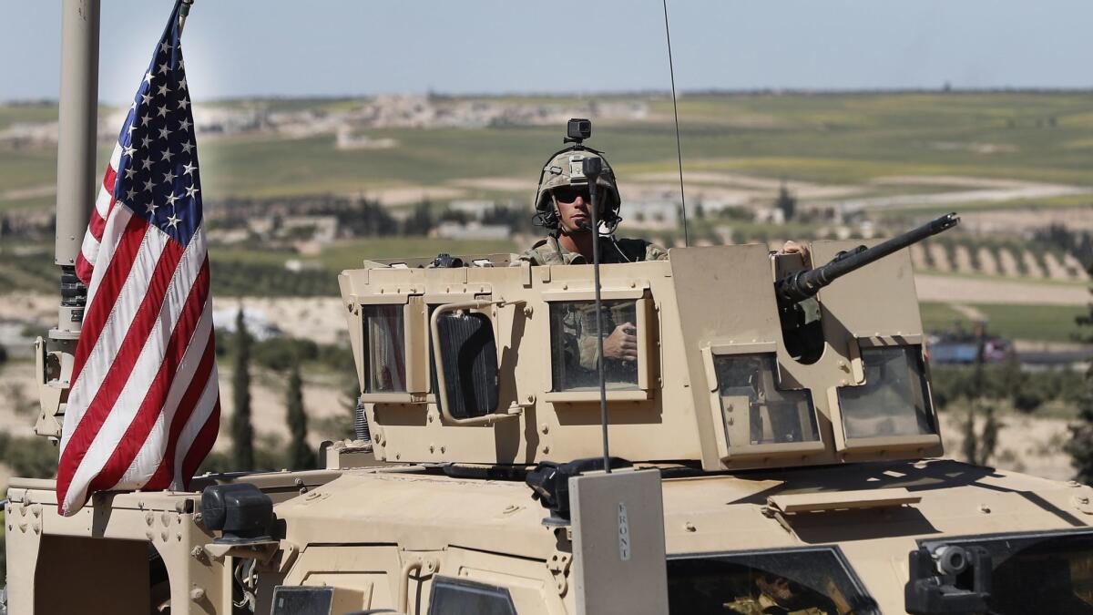 A U.S. armored vehicle in northern Syria in 2018. 