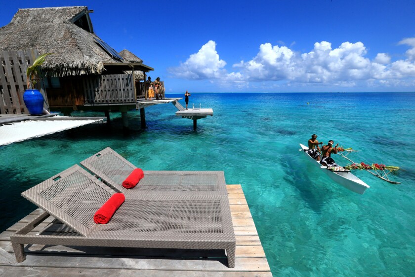 Overwater Bungalows Around The Globe Put Your Cares And Woes At Bay Los Angeles Times