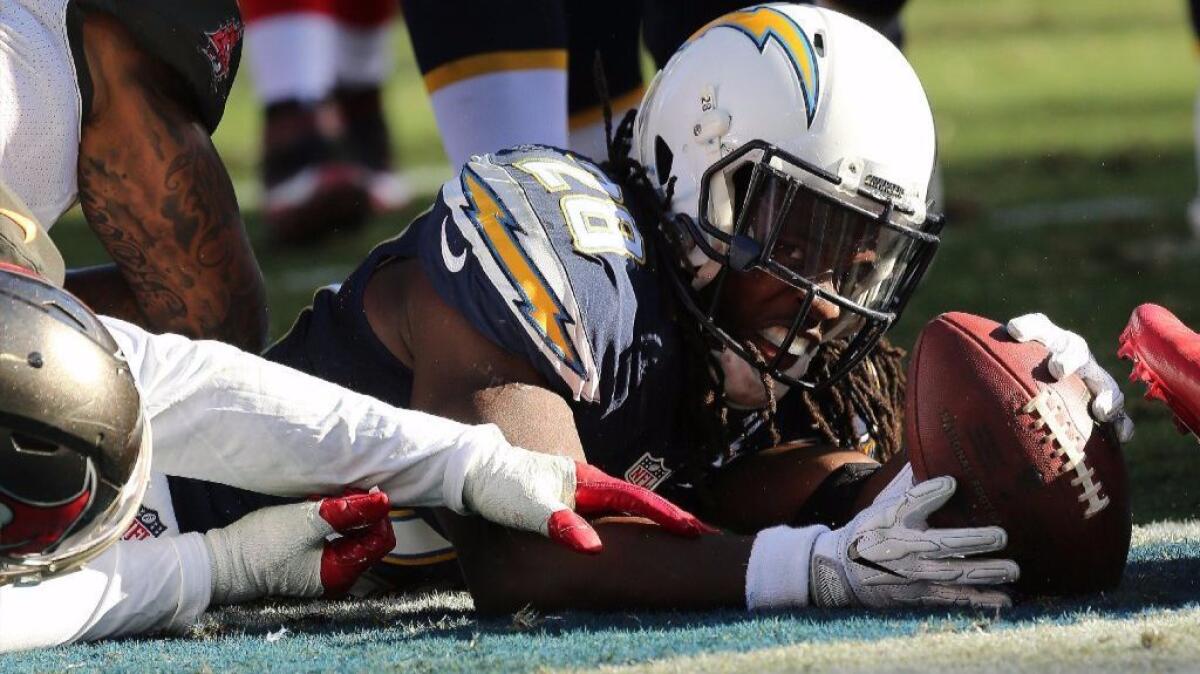 Chargers running back Melvin Gordon is tackled during a game against the Buccaneers in San Diego on Dec. 4.