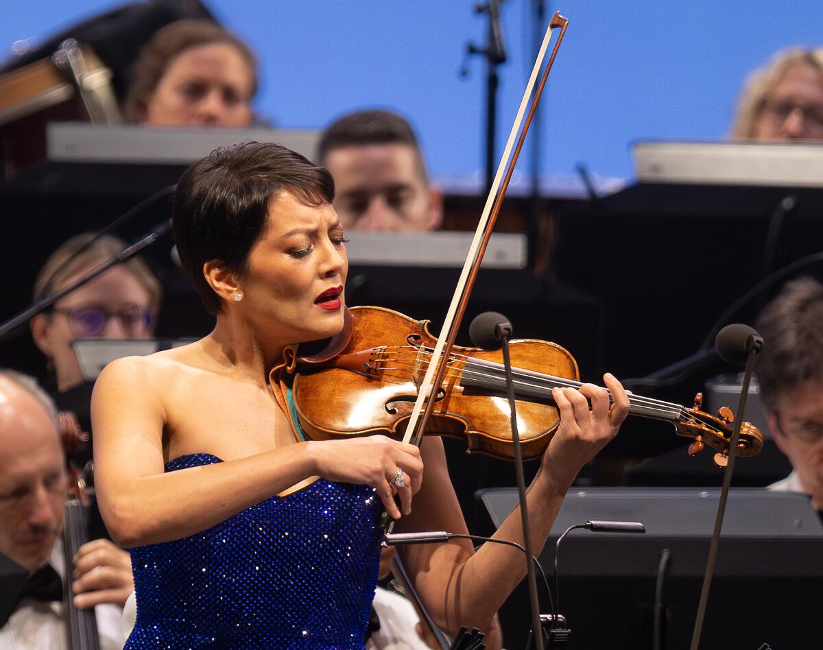 Anne Akiko Meyers, artistic director of the Laguna Beach Music Festival, performs at the Hollywood Bowl in September. 