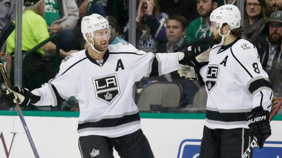 Kings center Jeff Carter, left, celebrates a goal with teammate Drew Doughty during a game in Dallas on Dec. 23.