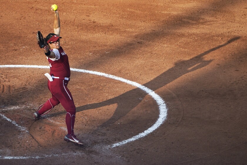 Oklahoma's Giselle Juarez pitches in the third inning of the second game of the NCAA Women's College World Series softball championship series against Florida State, Wednesday, June 9, 2021, in Oklahoma City. (AP Photo/Sue Ogrocki)