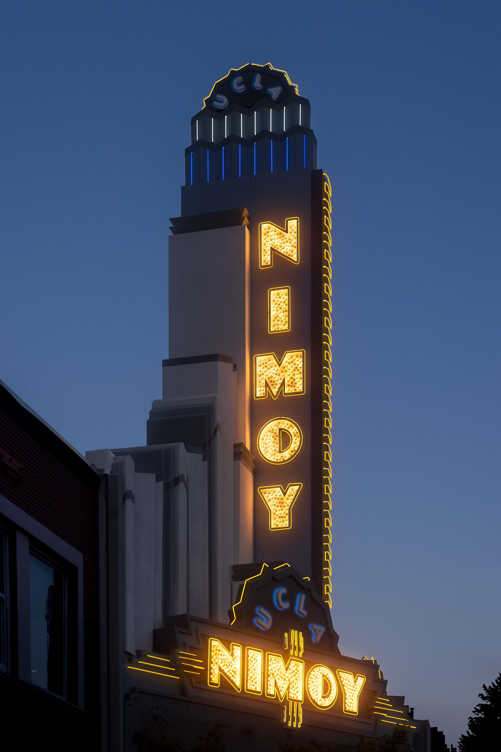 The marquee for the UCLA Nimoy Theater, lit up at dusk.