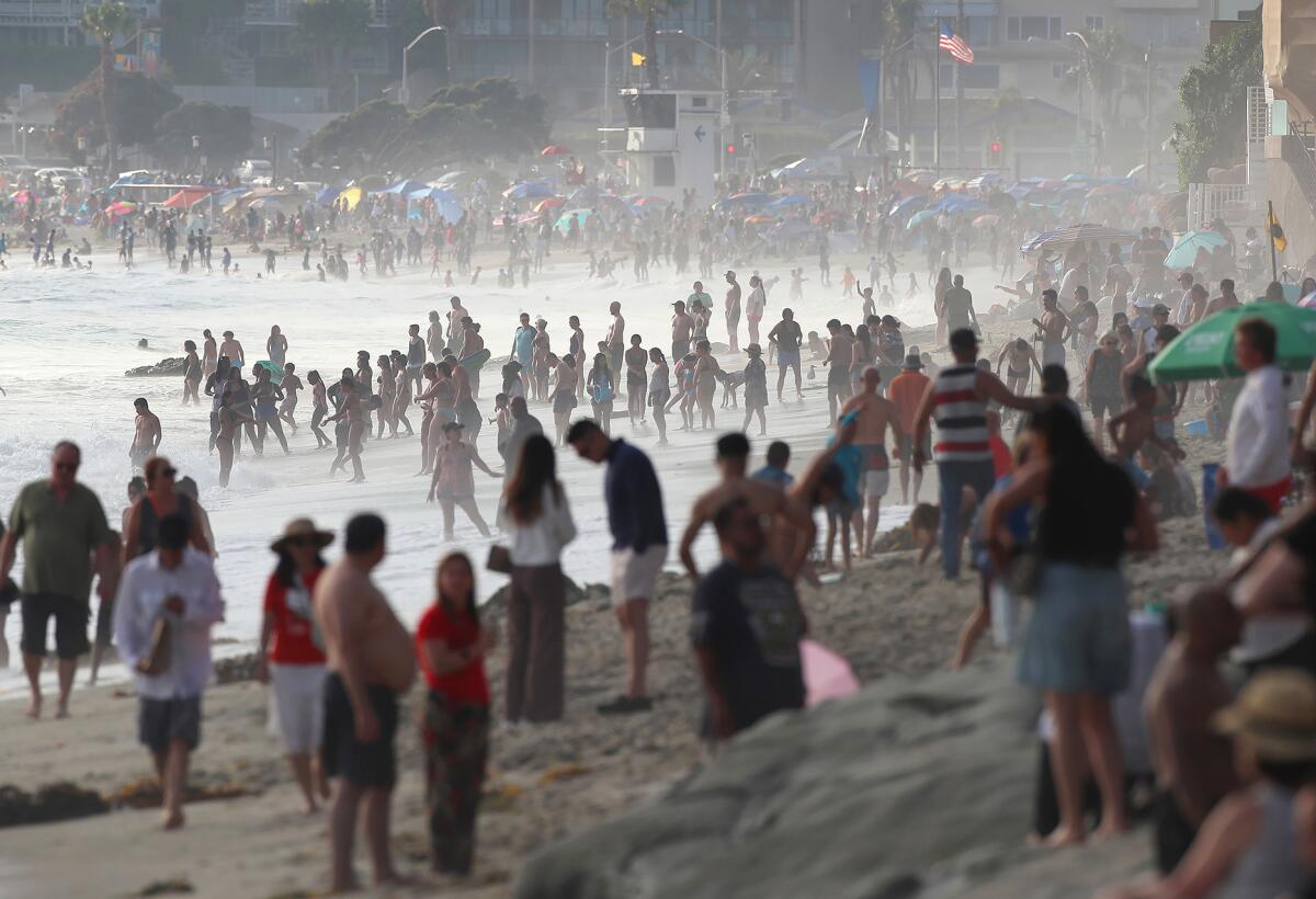 Crowds packing the Laguna Beach coastline