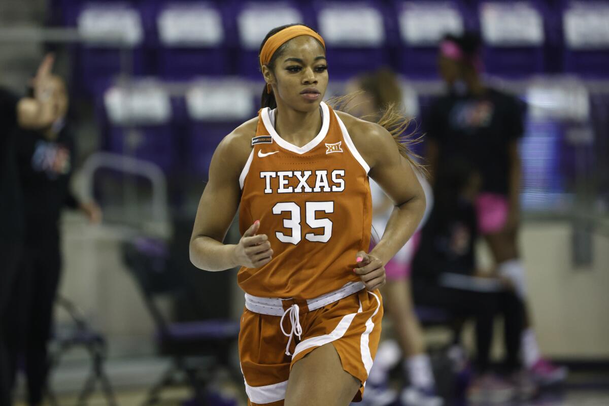 Texas center Charli Collier runs the court against TCU.