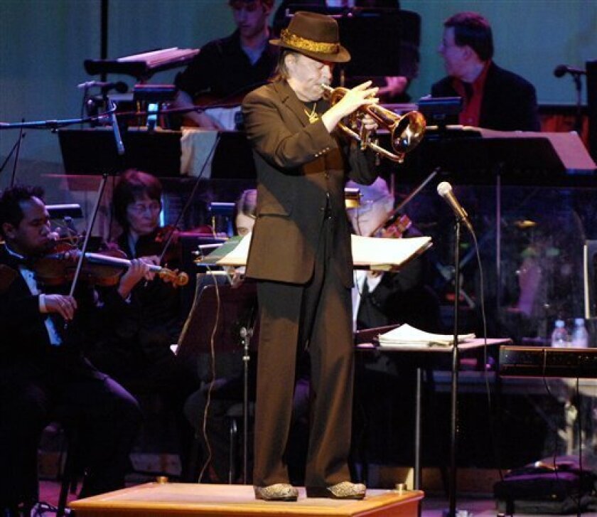 Chuck Mangione performs on stage with the Buffalo Philharmonic Orchestra at Kleinhans Music Hall in Buffalo, N.Y. on Friday, May 1, 2009. Mangione's concert was rescheduled after he lost two members of his band in the Flight 3407 plane crash in Clarence Center, N.Y. (AP Photo/Don Heupel)