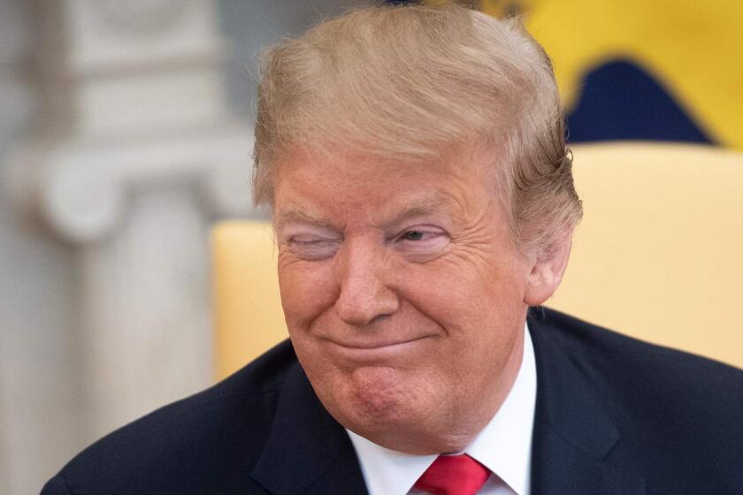 TOPSHOT - US President Donald Trump winks during a meeting with Israeli Prime Minister Benjamin Netanyahu in the Oval Office at the White House in Washington, DC, March 25, 2019. - US President Donald Trump on Monday signed a proclamation recognizing Israeli sovereignty over the disputed Golan Heights, a border area seized from Syria in 1967. "This was a long time in the making," Trump said alongside Israeli Prime Minister Benjamin Netanyahu in the White House. US recognition for Israeli control over the territory breaks with decades of international consensus. (Photo by SAUL LOEB / AFP)SAUL LOEB/AFP/Getty Images ** OUTS - ELSENT, FPG, CM - OUTS * NM, PH, VA if sourced by CT, LA or MoD **