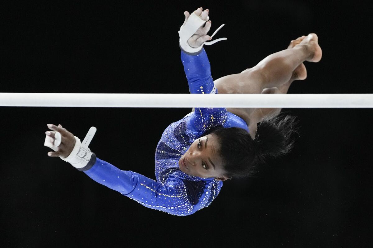 Simone Biles competes on the uneven bars during the gymnastics world championships in October.