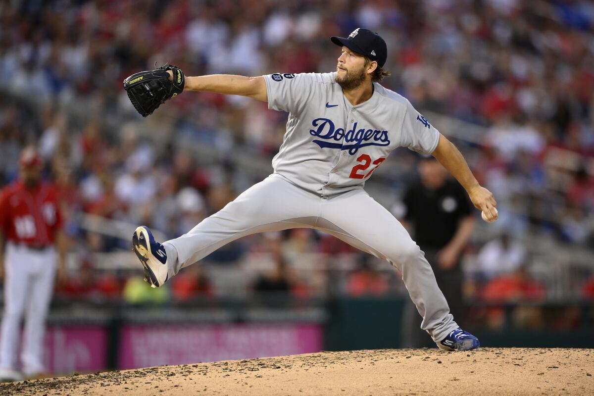 Los Angeles Dodgers starting pitcher Clayton Kershaw delivers a pitch during a baseball game.