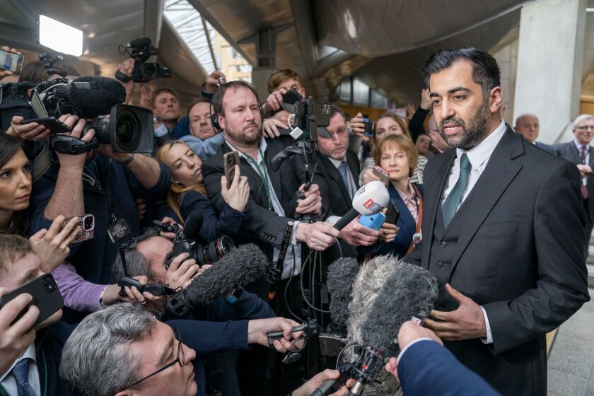 Humza Yousaf speaks to the media after being voted the new First Minister at the Scottish Parliament in Edinburgh, Scotland, Tuesday March 28, 2023. (Jane Barlow/PA via AP)
