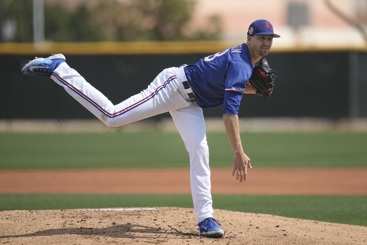 Texas Rangers right-hander Jacob deGrom pitches in spring training on March 13, 2023, in Surprise, Ariz.