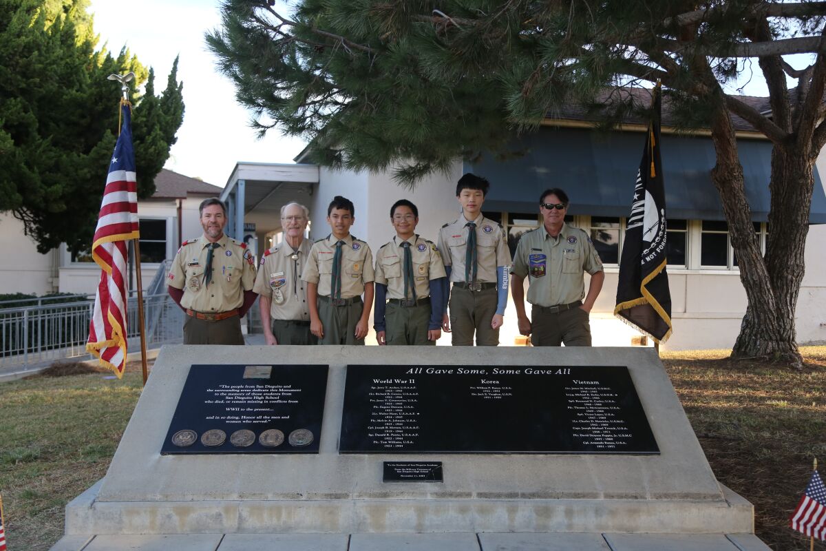 Boy Scout Troop 782 scrubbed, swept and shined the memorial at San Dieguito Academy.