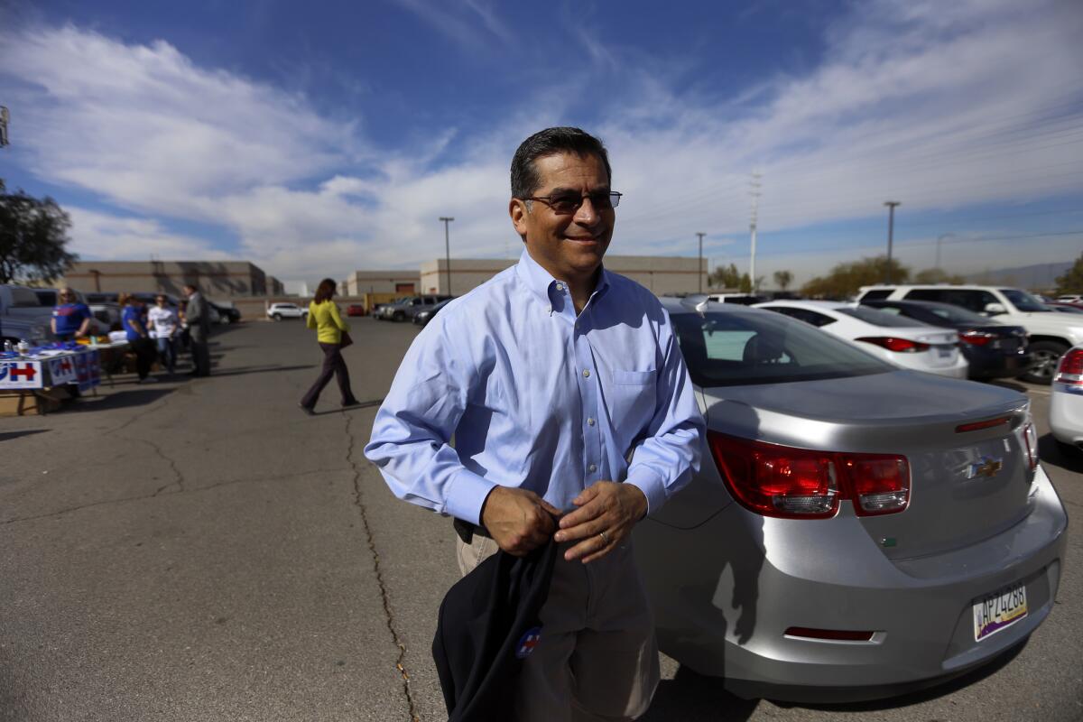 Rep. Xavier Becerra of L.A., chairman of the House Democratic Caucus, rushes into Painters Hall in Henderson, Nev.