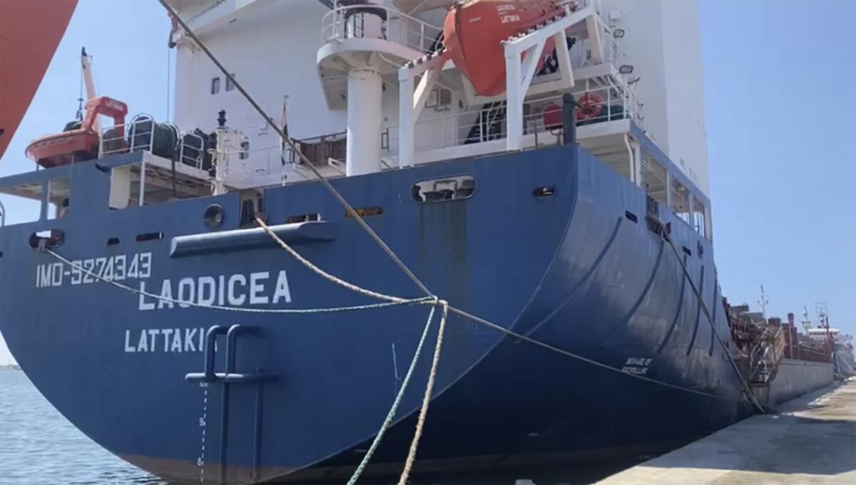 FILE - This frame grab from a video, shows a Syrian cargo ship Laodicea docked at a seaport, July 29, 2022, in Tripoli, north Lebanon. The office of Lebanon’s prosecutor general Tuesday, Aug. 1, 2022, allowed a Syrian ship said to be carrying Ukrainian grain stolen by Russia to leave a port in the country’s north, officials said, after an investigation showed it was not carrying stolen goods. However, the ship Laodicea cannot leave the port of Tripoli because a judge ordered Monday that it may not sail for 72 hours at the request Ukrainian authorities. (AP Photo, File)