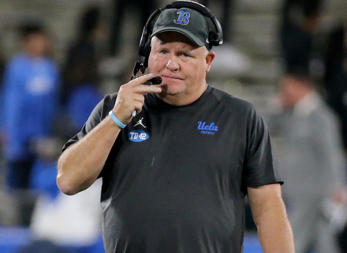 UCLA coach Chip Kelly stands on the sideline during a win over Stanford on Oct. 29.
