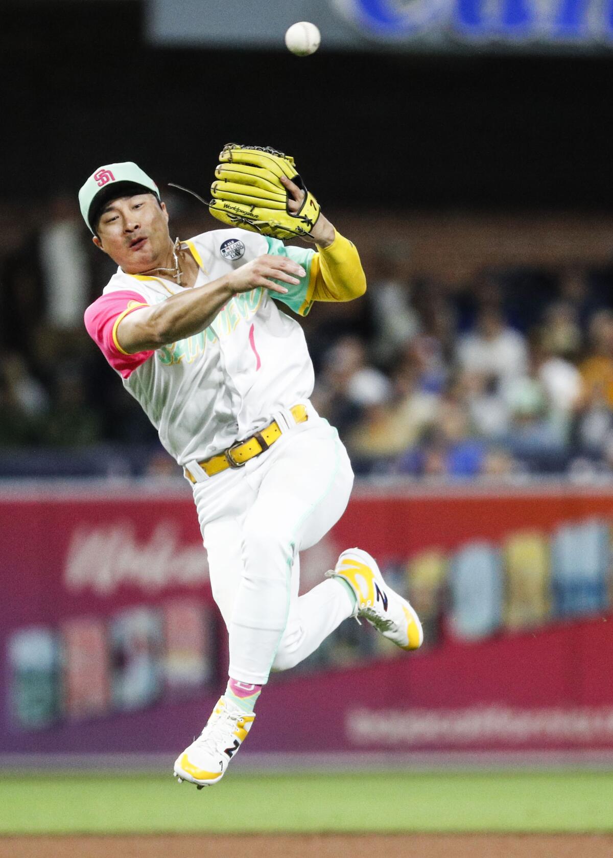 San Diego Padres' Ha-Seong Kim batting during the second inning of a  baseball game against the San Francisco Giants, Friday, July 8, 2022, in  San Diego. (AP Photo/Gregory Bull Stock Photo 