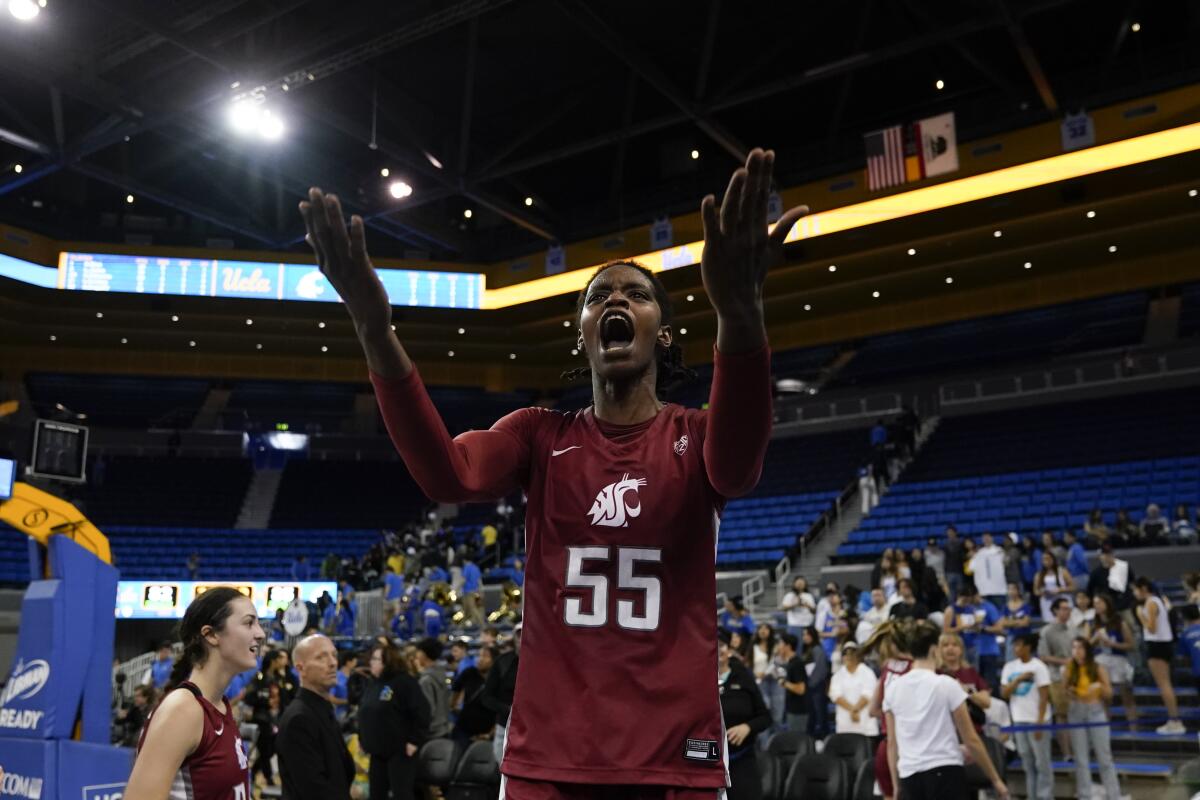 Washington State center Bella Murekatete celebrates after the Cougars' win over UCLA on Sunday at Pauley Pavilion.