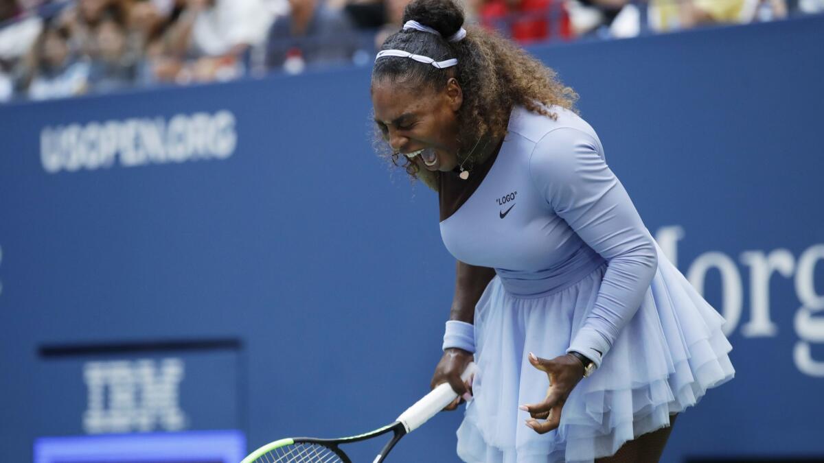 Serena Williams reacts after a point against Kaia Kanepi during the fourth round of the U.S. Open on Sunday in New York.