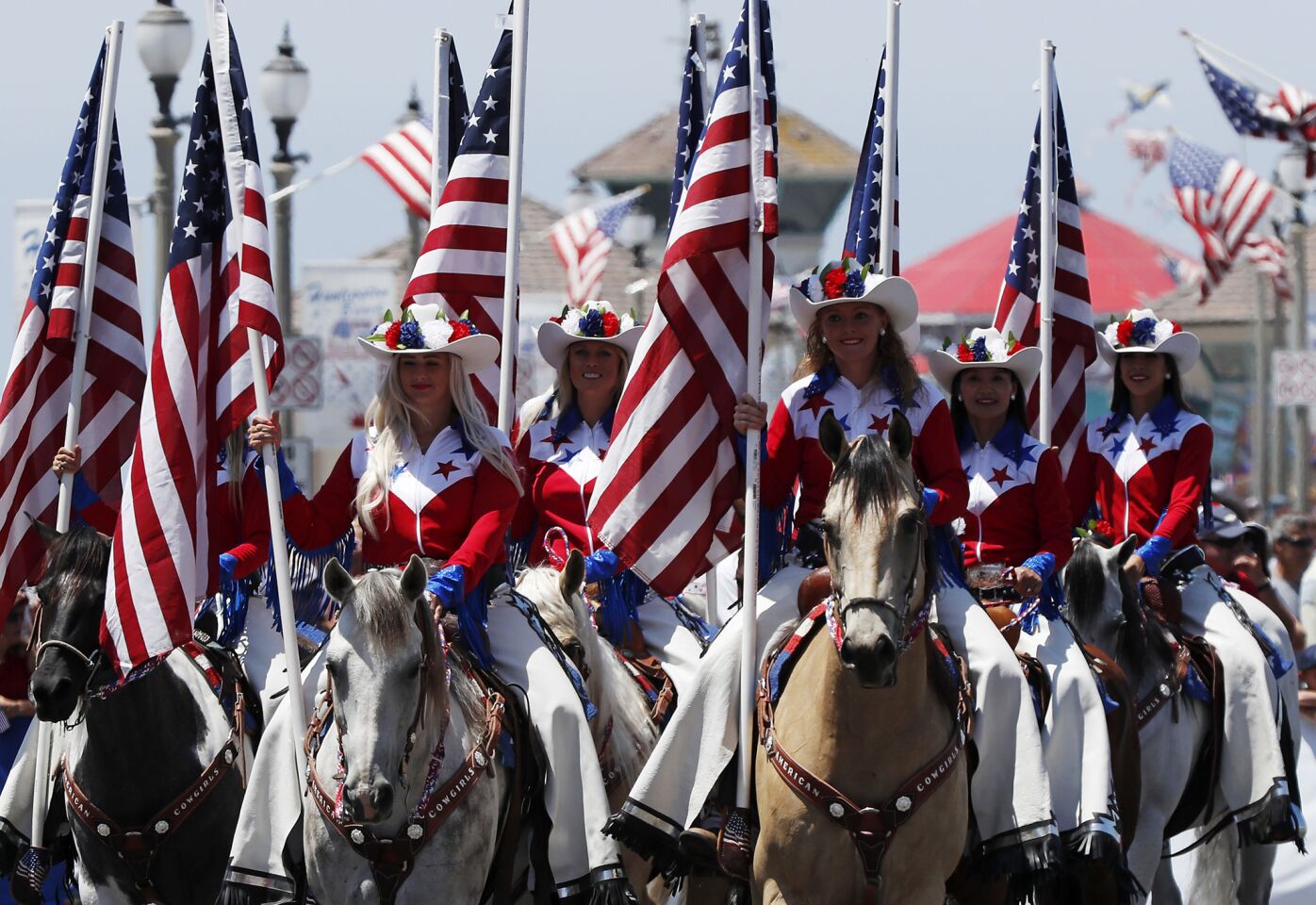 An equestrian team gets into the holiday spirit on Main Street during the annual Independence Day Parade in Huntington Beach.
