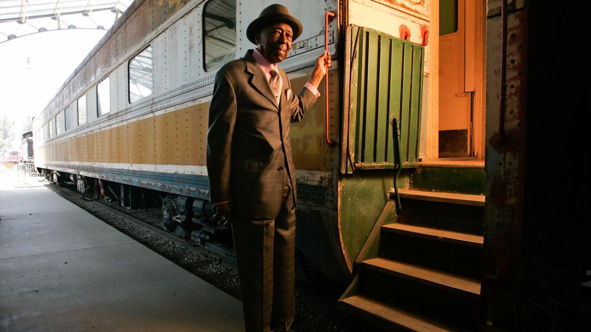 Lee Wesley Gibson in 2010, photographed next to a 1937 Pullman dormitory car.