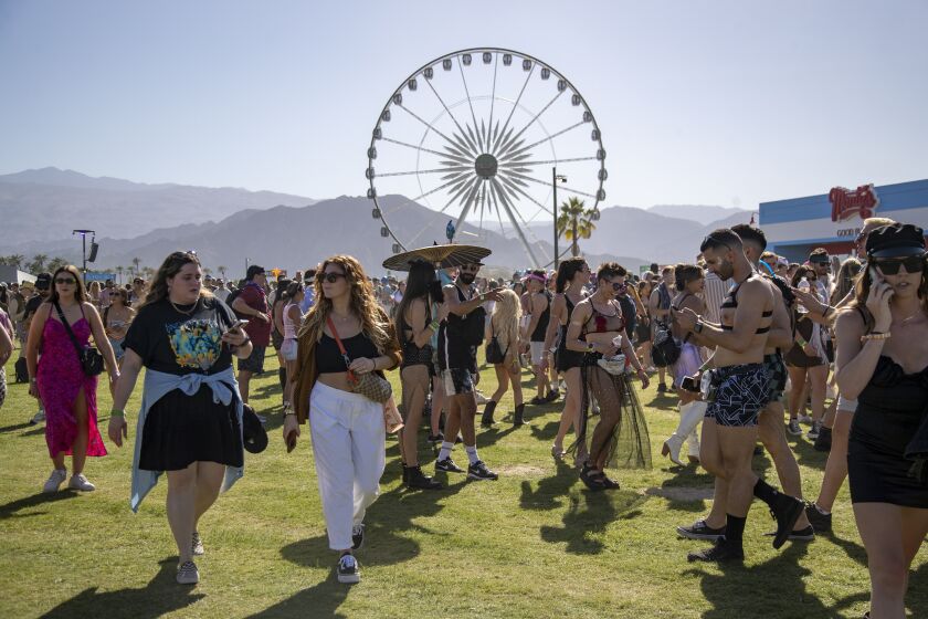INDIO, CA - APRIL 15, 2022: Crowds pour into the Empire Polo Grounds on the first day of the Coachella Music Festival on April 15, 2022 in Indio, California.(Gina Ferazzi / Los Angeles Times)