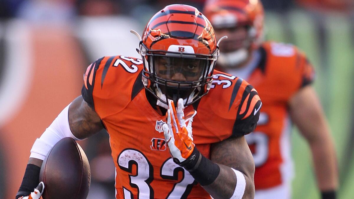 Cincinnati Bengals running back Jeremy Hill scores on a 60-yard carry against the Jacksonville Jaguars on Sunday.