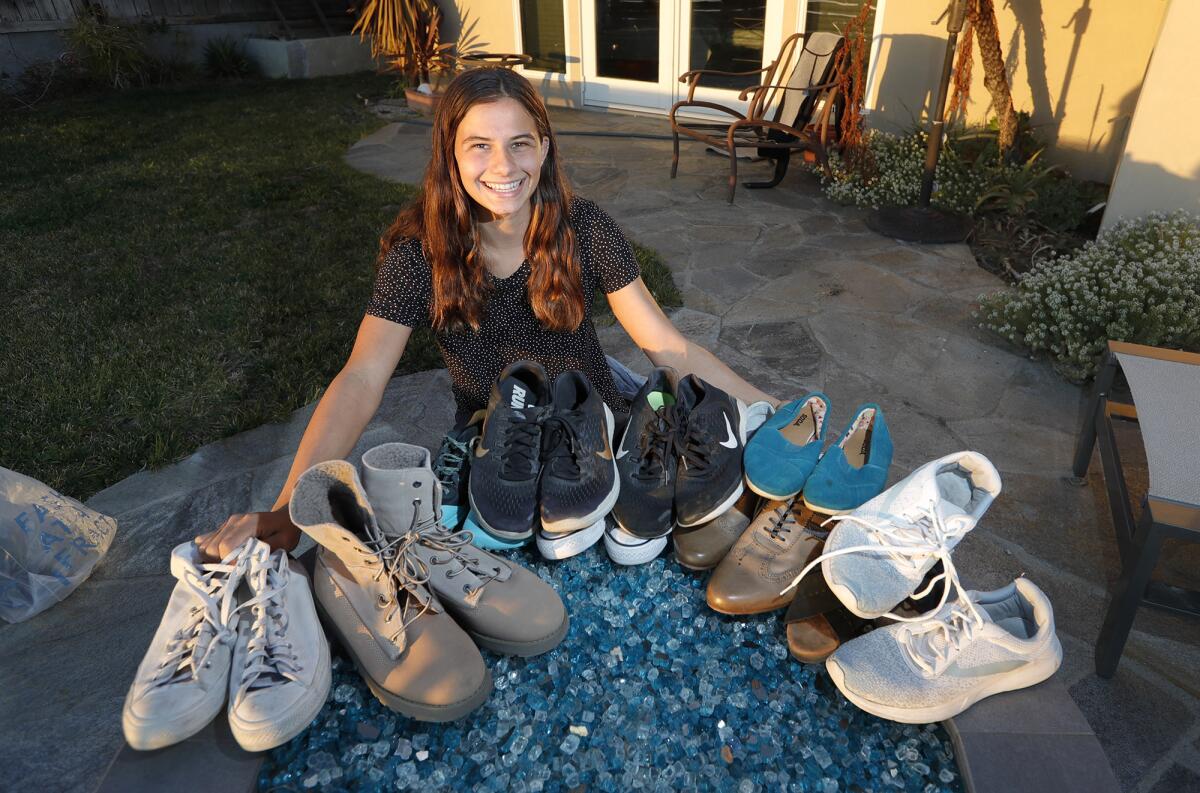 Jessie Rose, a Laguna Beach High School senior, is holding her third shoe drive through Feb. 15. 